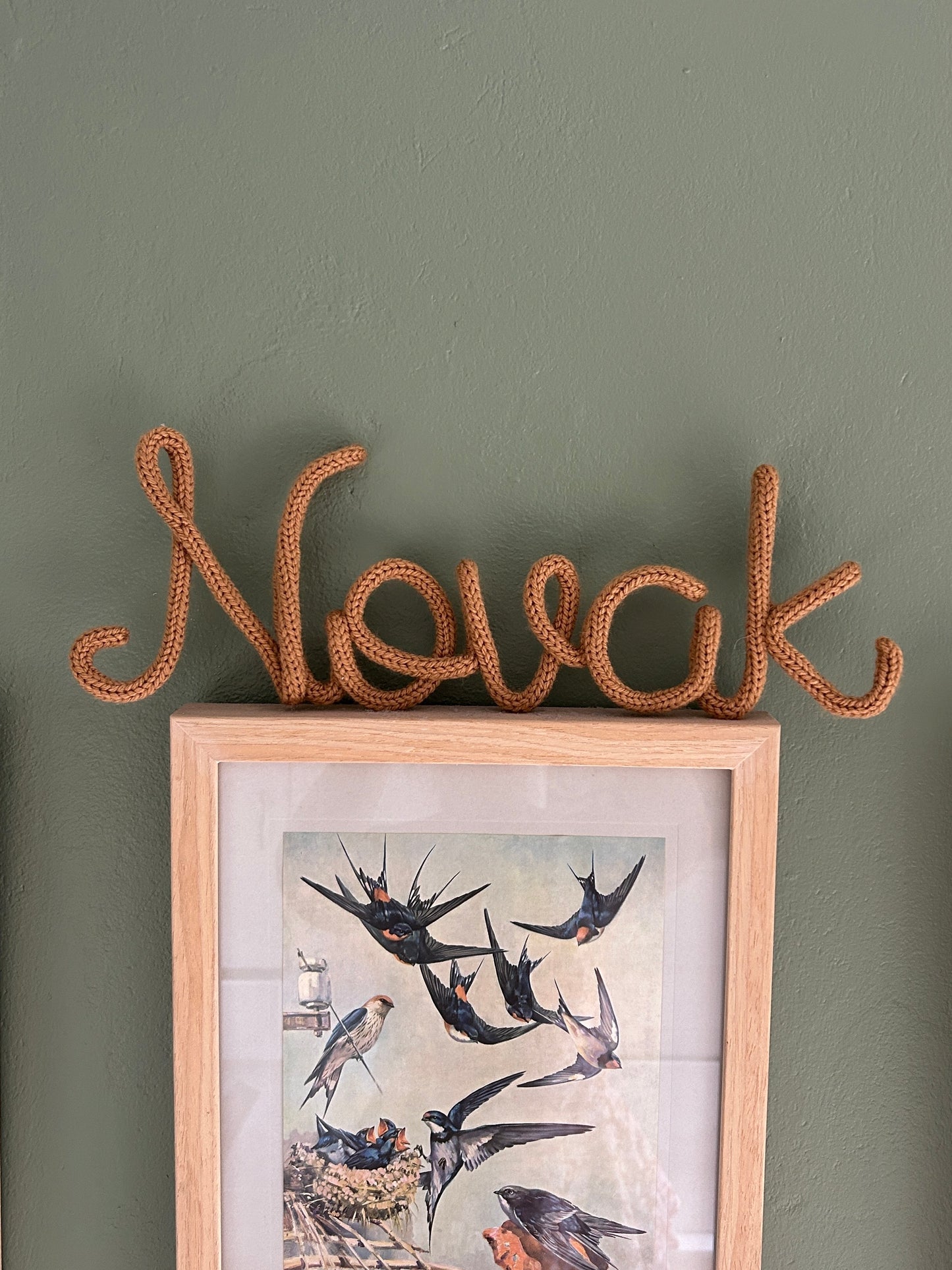 Knitted name wall hanging